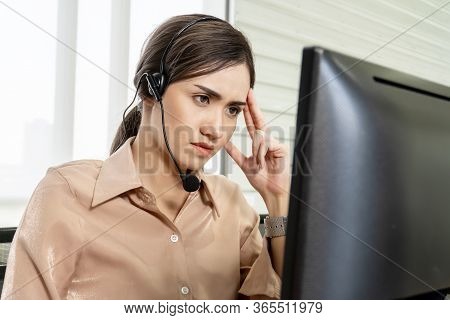 Call Center, Service Desk Consultant Talking On Hands-free Phone,
Young Woman Operator From Call Cen