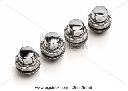 Car Lock Nuts, Wheel Nut That Protect The Wheels From Theft. Close-up Of The Isolate On A White Back