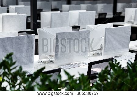Unemployment, Coronacrisis. Big Office With Covered Computers With No Workers, Remote Work, Panorama