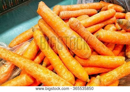 Mobile Photo. Fresh Carrots On The Supermarket Window