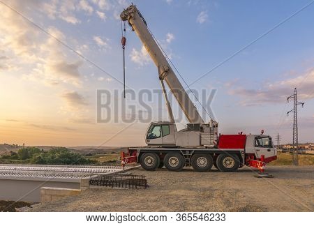 Crane Trucks In The Construction Of A Bridge