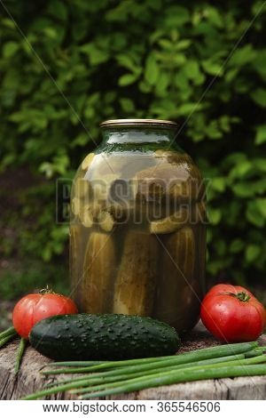 Canned Pickles In A Jar.canned Pickled Vegetables In A Glass Jar