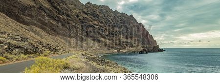 Wide Angle Panorama. Roque De Bonanza Is One Of The Symbols Of El Hierro Island And Its Natives. Hug
