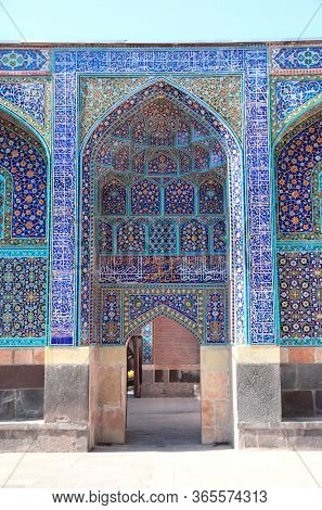 Arches with mosaics at the entrance to Shrine Ensemble, mausoleum and khaneghah of Sheikh Safi al-din, Ardabil, Iran. Inscription at the entrance - text from the Quran. UNESCO world heritage site