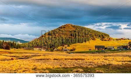 Bukovec Mountain Above Jizerka Village At Sunset Time. Spring In Jizera Mountains, Czech Republic.