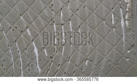 Grooves From The Spatula On The Wall After Removing The Tile