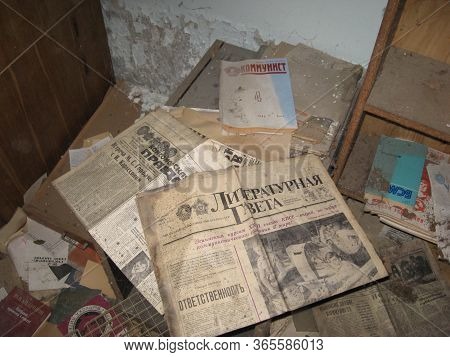 Pripyat, Ukraine - 07.10.2016: Scattered Old Books On The Floor, Abandoned Library In Ghost Town Pri
