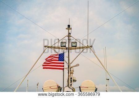 Provincetown Marina Star And Stripes Reflected In The Water Provincetown Ma Us