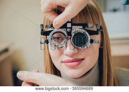Trial Frame. Glasses For A Young Woman. Ametropia Correction With Glasses.