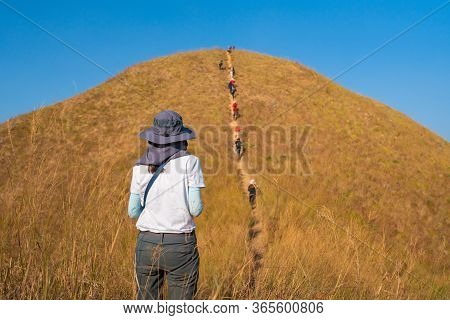 Traveler Female Hiking Enjoying In The Mountains At Khao Chang Puak Mountain Thailand.