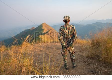 Forester Or Forest Ranger Hiking In The Mountains At Khao Chang Puak Mountain Thailand