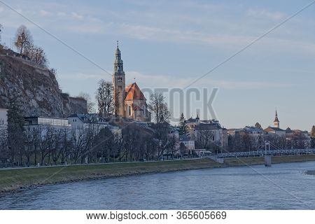 Salzburg, Austria, February 22, 2020: Panoramic View Of Mulln Church On Winter Day In Salzburg Austr