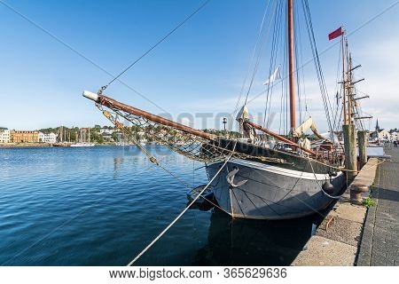 Scenic View Of The Waterfront With Historic Sailing Vessel In Flensburg, Germany