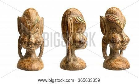 Old Dark Traditional Wooden African Figurine On A White Background In Three Angles
