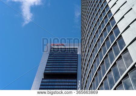 Madrid, Spain - May 10, 2020: Low Angle View Of Office Building In The City Of Madrid Against Blue S