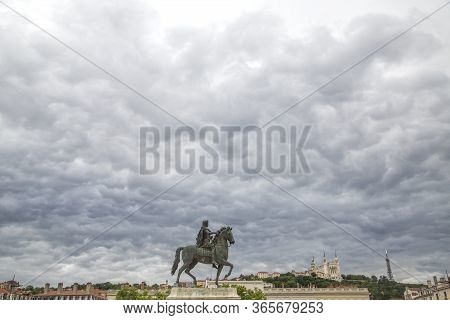 Statue Of Louis. In The Centre Of Place Bellecour Lyon-france Stands An Equestrian Statue Of King Lo
