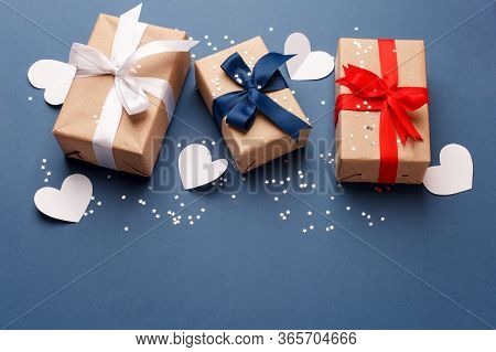 Red, Blue And White Gift Boxes And White Heart On Classic Blue Background In The National Colors Of 