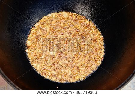 National Uzbek Dish Pilaf, Pilaw, Plov, Rice With Meat In Big Pan. Cooking Process, Open Fire. Cooki