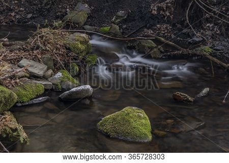 Lomna River In Trojanovice Village In Spring Hot Day