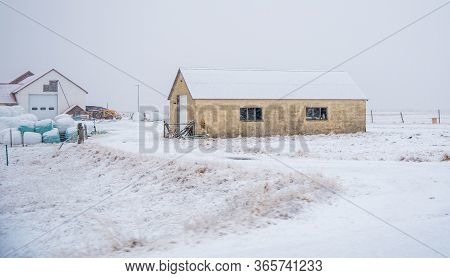 Warehouse In Winter During A Stormy Weather At Snæfellsnes Peninsula In Iceland.