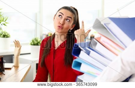 Girl Is Unhappy With Number Folders Man Carries. Multitasking In Workplace. Superiors Are Putting La