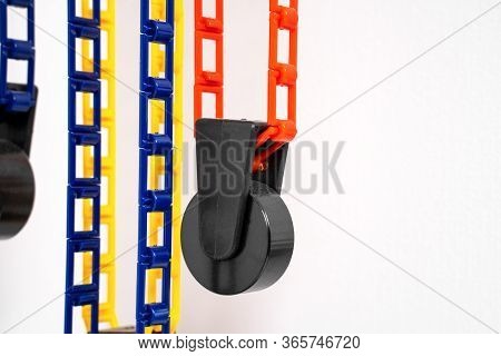 The Counterweights Of System Of Special Photographic Backgrounds Hanging From Above. Colorful Plasti