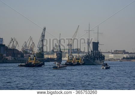 Saint Petersburg, Russia. September, 21, 2014. Legendary Cruiser Aurora Is Trailled To Ship Repair D