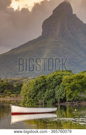 Boat In Tamarin Bay Sheltered By Rempart Mountain, Black River District, Mauritius