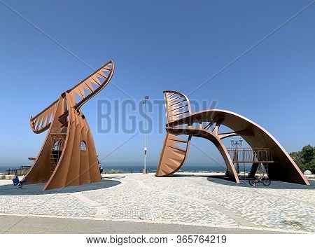 Ashkelon, Israel - May 08, 2020: Childrens Slides In The Form Of Fish Tails On The Embankment In Ash