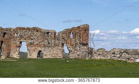 Ludza Medieval Castle Ruins On A Hill Between Big Ludza Lake And Small Ludza Lake. The Ruins Of An A