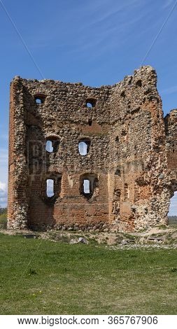 Ludza Medieval Castle Ruins On A Hill Between Big Ludza Lake And Small Ludza Lake. The Ruins Of An A