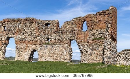 Ludza Medieval Castle Ruins On A Hill Between Big Ludza Lake And Small Ludza Lake. The Ruins Of An A