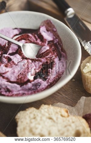 Breakfast In Rustick Dtyle. Wooden Tray With Cottage Cheese With Berries, Bread And Butter