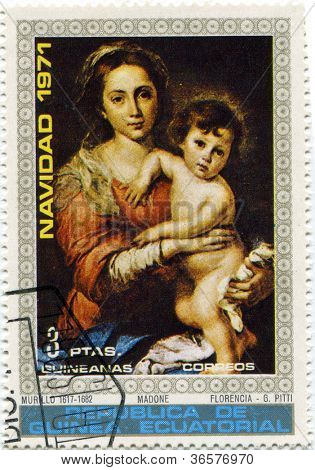 Republikken af GINEA, CIRCA 1971: Madonna med Jesus barnet på frimærke, circa 1971