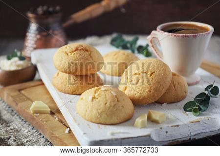 Coconut Cookies With White Chocolate And  Cup Of Coffee For Sweet Coffee Break. Toned Image
