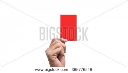 Referee a hand holding  red cards. isolated