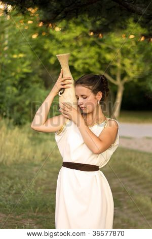 Greek Girl With Vase In The Summer Garden