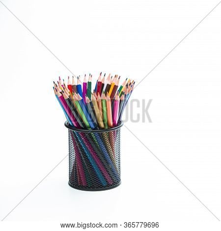 Arts And Craft Ideas. Bunch Of Colored Wooden Pencils Placed Together In Metal Round Holder. Isolate
