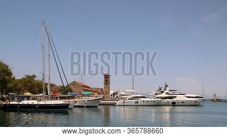 View The Embankment And Evangelismos Church, Rhodes, Greece