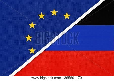 European Union Or Eu Vs Donetsk People's Republic Or Dnr National Flag From Textile. Symbol Of The C