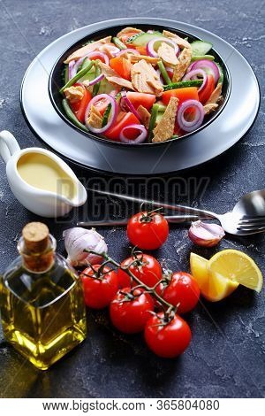 Refreshing Vitamin Green Bean And Tuna Salad With Vegetables: Tomatoes, Cucumber, Red Onion On A Dar