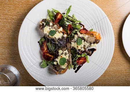 Crostini With Sautéed Forest Mushrooms, Garlic, Basil And Mozzarella.traditional Italian Antipasti A