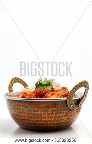Indian Food Or Indian Curry In A Copper Brass Serving Bowl