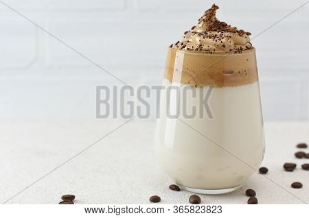 Dalgona Coffee In Glass Decorated With Coffee Beans. Dalgona Coffee, A Trendy Fluffy Creamy Whipped 
