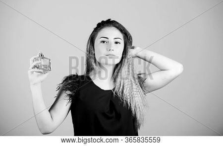 Born To Rule. Girl With Bottle Of Perfume. Beauty Product. Woman With Bottle Of Perfume. Girl Applyi