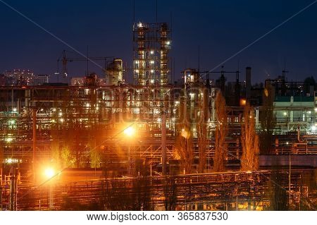 Chemical Factory At Summer Night. Rectification Towers