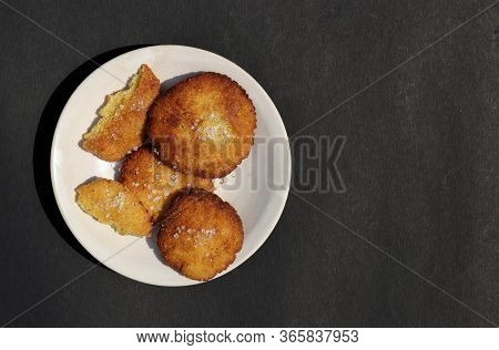 Homemade Semolina Cookies In A Plate Isolated On Black Background With Copy Space