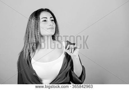 Street Style. Girl Stylish Hairstyle On Blue Background. Extra Volume. Hair Crimping Method Styling 