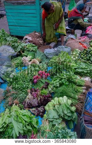 Kolkata, West Bengal, India - 16th December 2018 : Vegetables Are Being Sold Roadside. Young Woman I