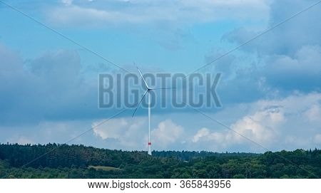 Landscape With Windmills Under The Clody Sky